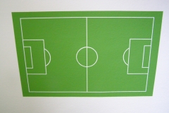 Fussballfeld an der Wand